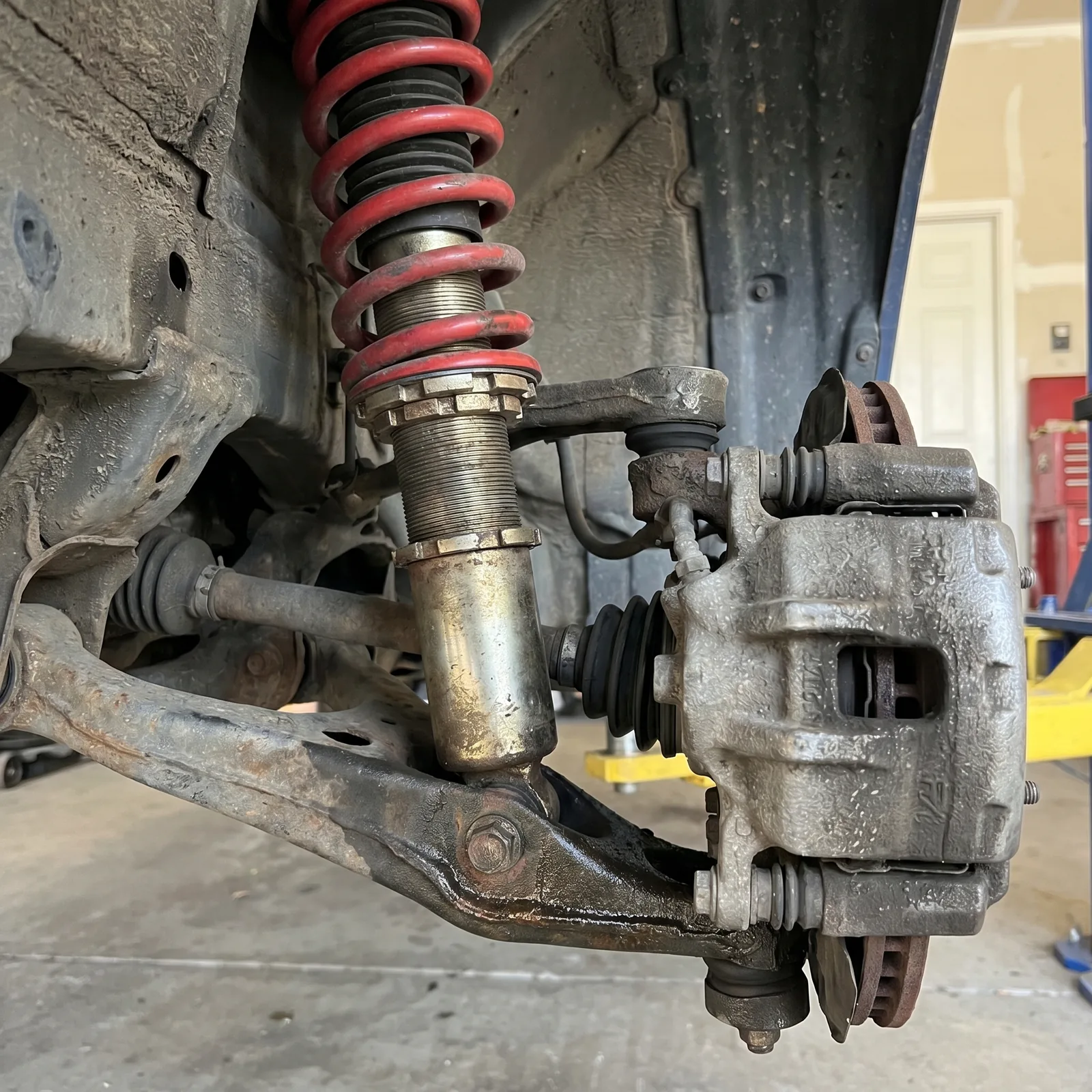 Wheel alignment service on a vehicle